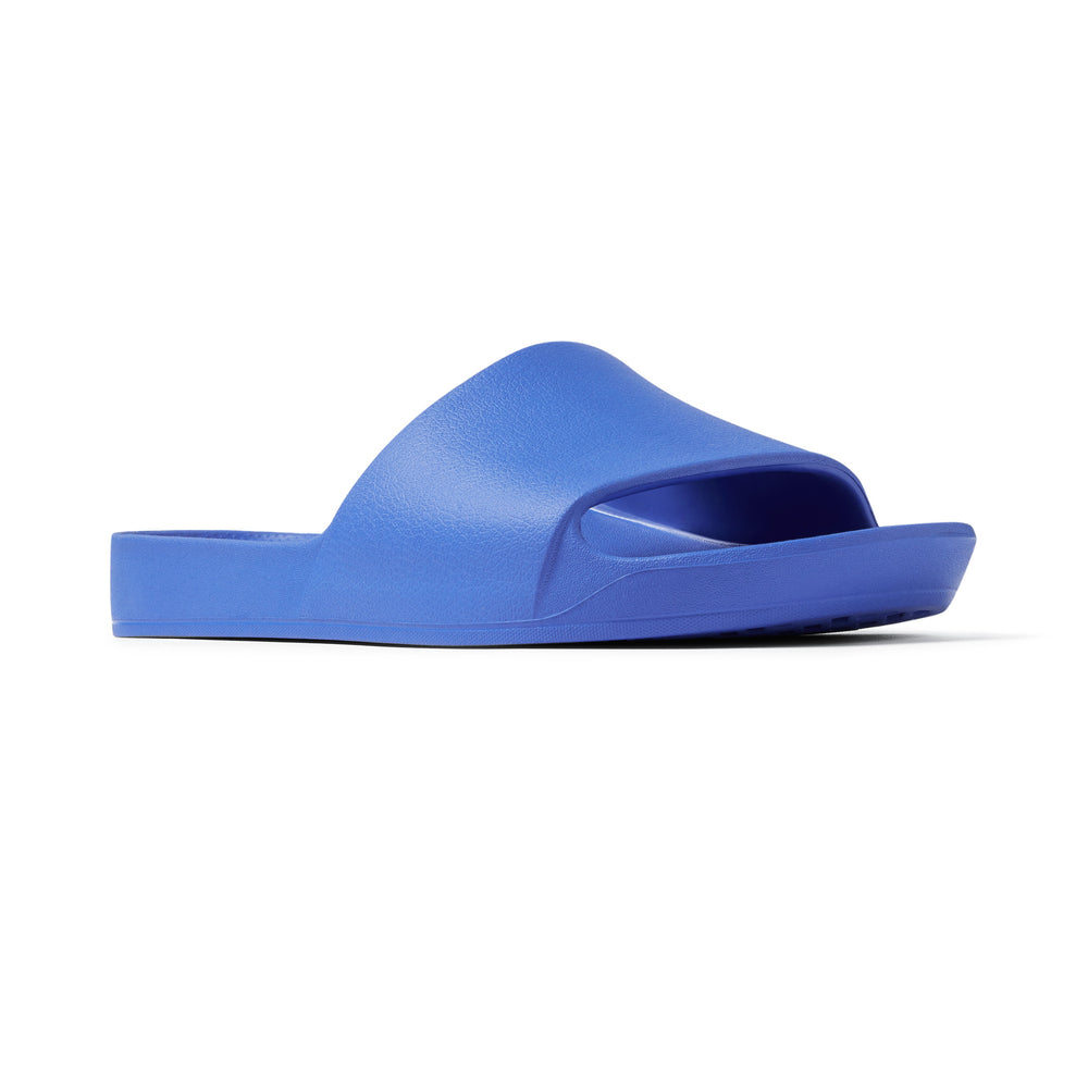 Royal Blue Arch support slides right shoe facing right at a 3/4 angle studio image 