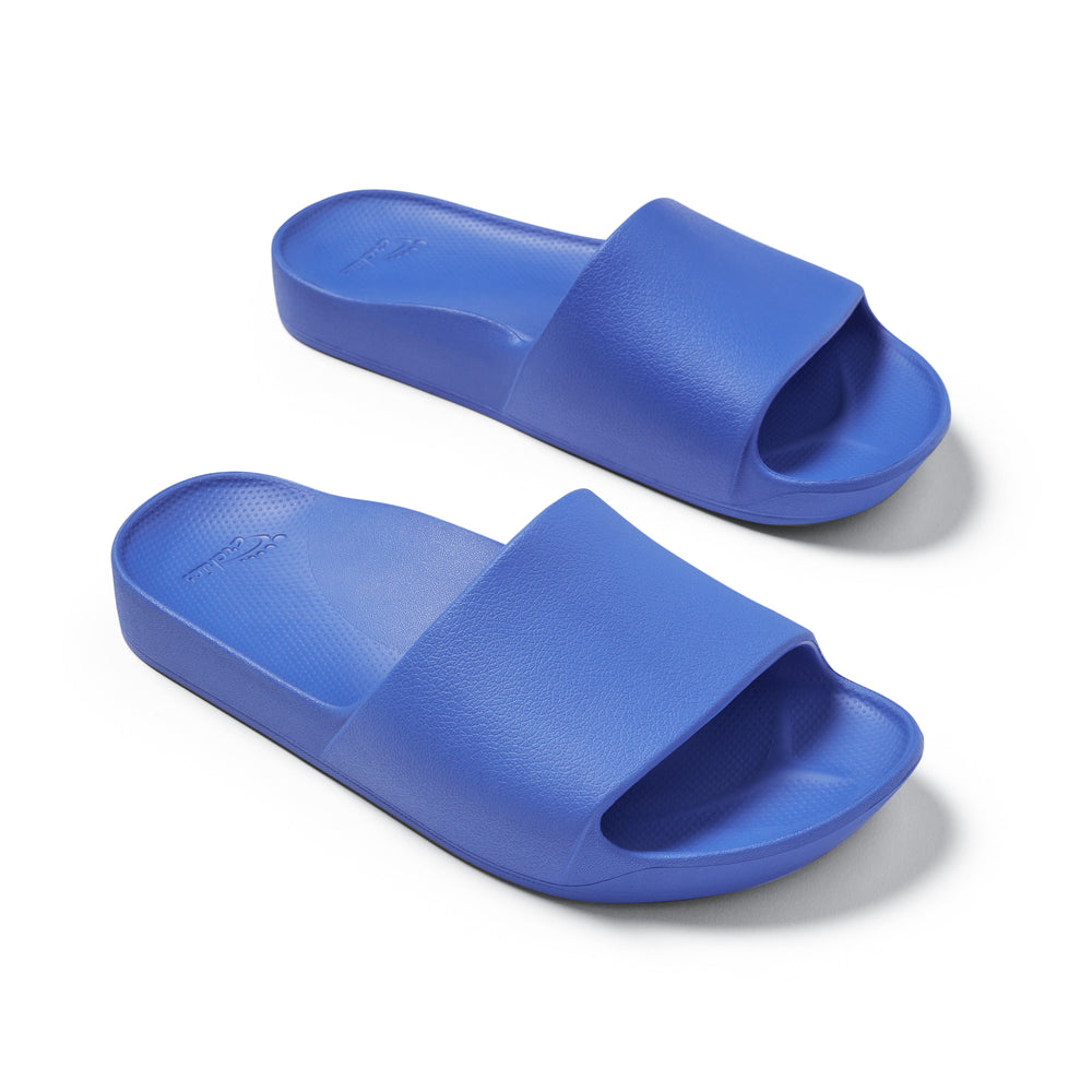 Royal Blue Arch support slides top down 3/4 angle studio image 