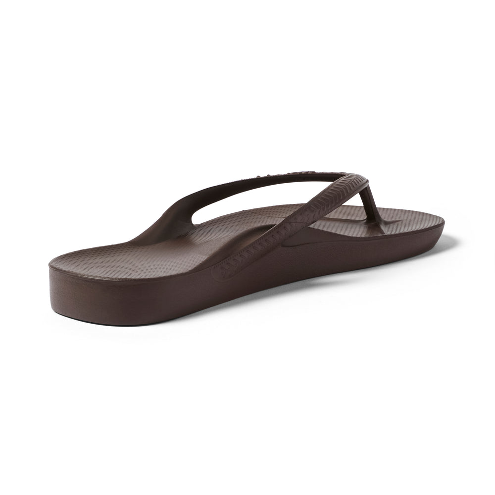Archies Brown Arch Support Flip Flops — Left shoe back 3/4 angle showing arch and heel cup 